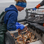 Prince Rupert crab fisher Chelsey Ellis working on a boat.