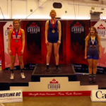 Standing on the podium, Sara McPhail's gold medal shines bright. Her victory in the Under 17, 69 Kilos girls divisions at the 2023 Canadian Wrestling Championships is the result of months of gruelling training and intense competition, including regionals, provincials, and the B.C. Summer Games. At only 14 years old, McPhail's achievement makes her one of the youngest Under 17 wrestling champions in the country - a testament to her immense talent and potential for even greater success in the future.