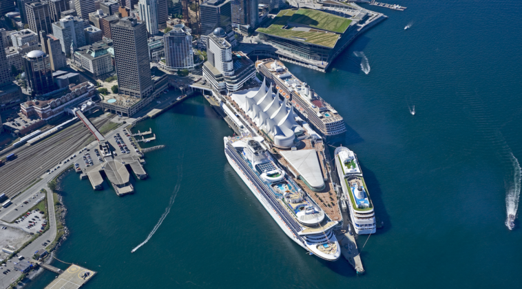 Amidst the stunning beauty of Vancouver's harbor, the cruise ship stands tall as a symbol of luxury and leisure, yet also a reminder of the environmental challenges that come with marine travel.