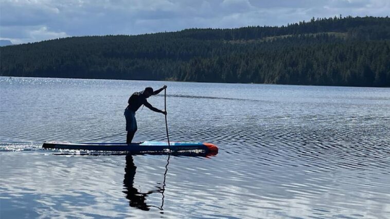 Dallas Allison paddleboarding for the Prince Rupert Hike for Hospice.