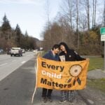 Kimberly (left) and Jordan Joseph on Highway 99, Sḵwx̱wú7mesh (Squamish). The couple planned a walk from “Prince Rupert” to “Victoria” raising awareness for indigenous children in foster care